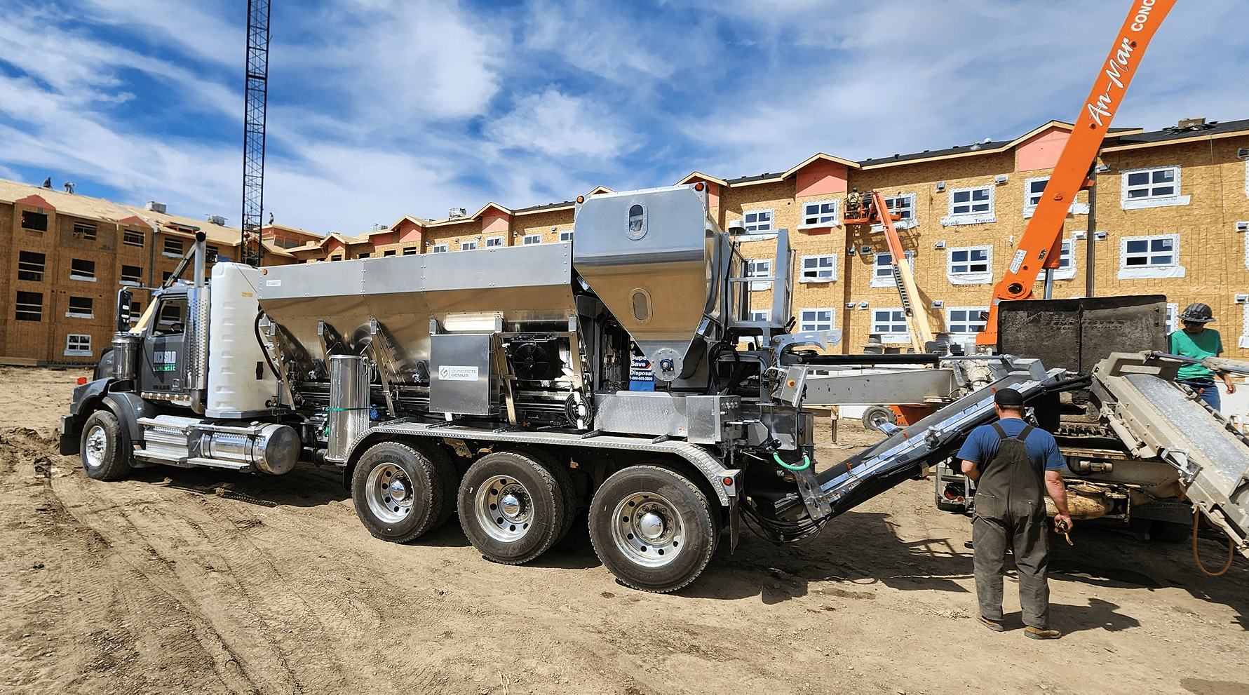 Operator working beside Omni Mixer during on-site pour